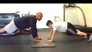 'Elevate Fitness\' Coach Joynier adding a little fun to planks!'