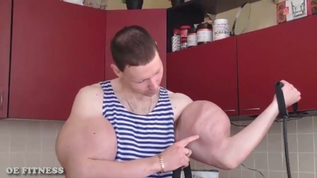 'Russian Kid Shows Off His Fake Muscles'