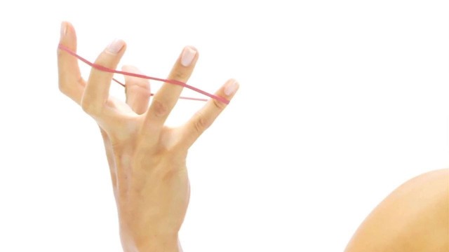 'Finger exercise with rubber band - great for climbing !'