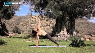 'Proud Warrior Yoga Pose by Fotini Bitrou - Pure Fitness'