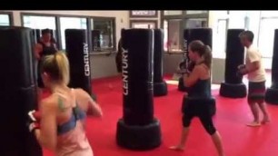 'Men and woman love the kickboxing program at Torched Kickboxing and Fitness Center'
